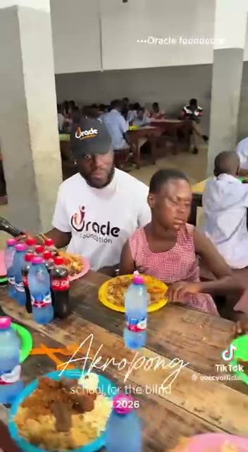 Oracle Foundation volunteers serving lunch to students at Akropong School for the Blind